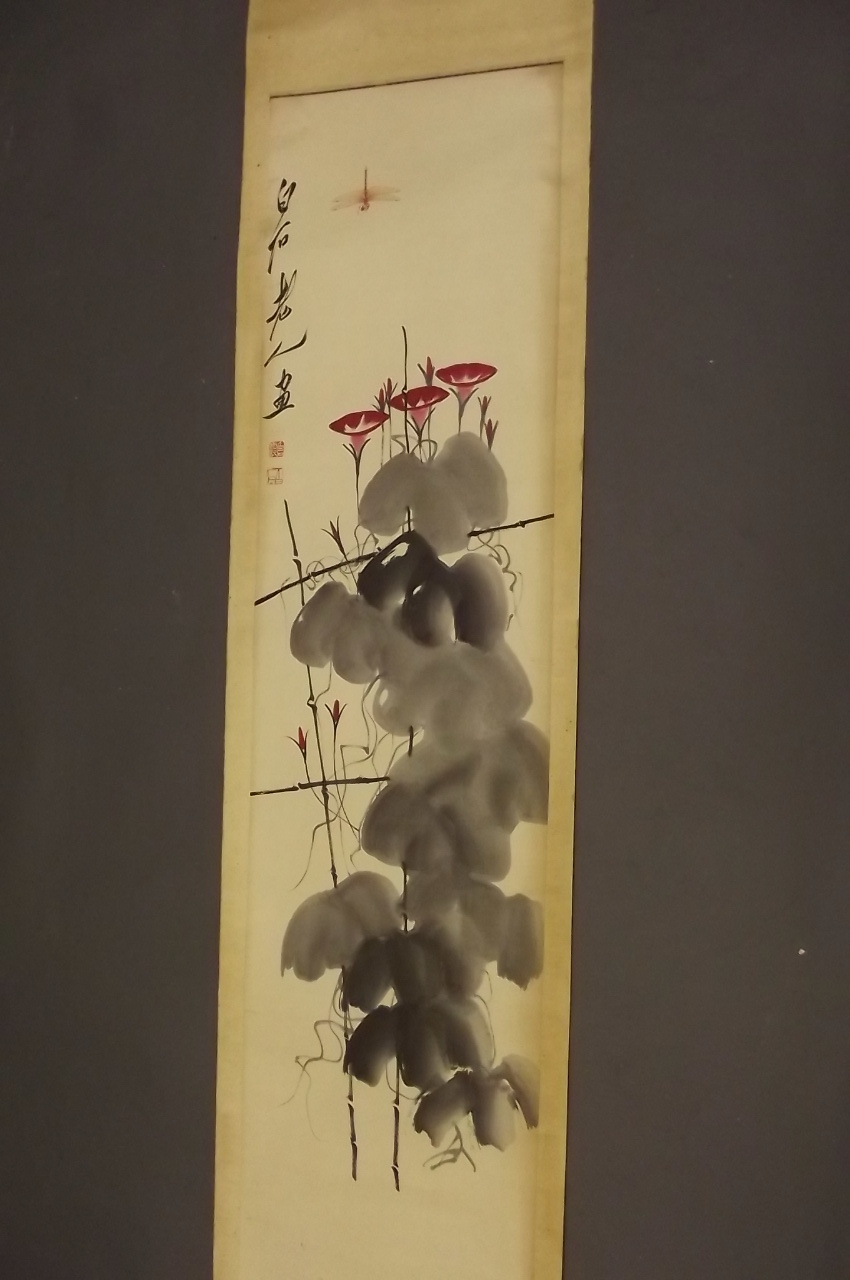 A Chinese painted scroll depicting dragonfly above flowers, signed, 66'' x 15½''