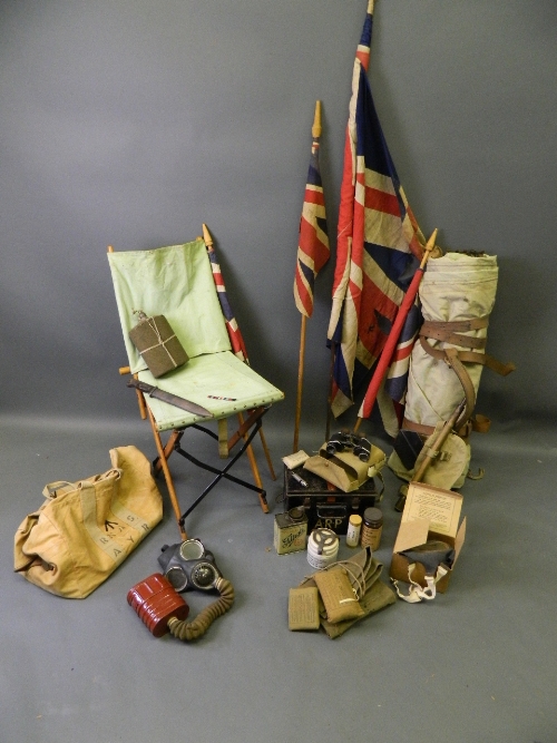 A quantity of WWII items including A.R.P. tin box and contents, flags, campaign chair and bed, etc