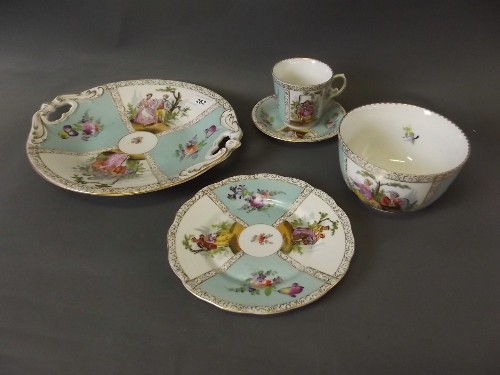 A C19th German hand painted cabinet cup and saucer, 2 matching dishes and a bowl, 11½'' diameter