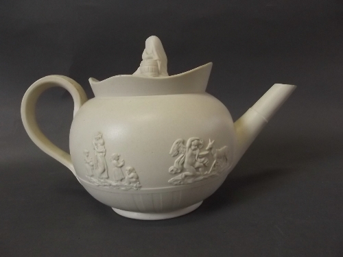 A good early C19th stoneware pottery teapot surmounted by a maiden, decorated in relief with