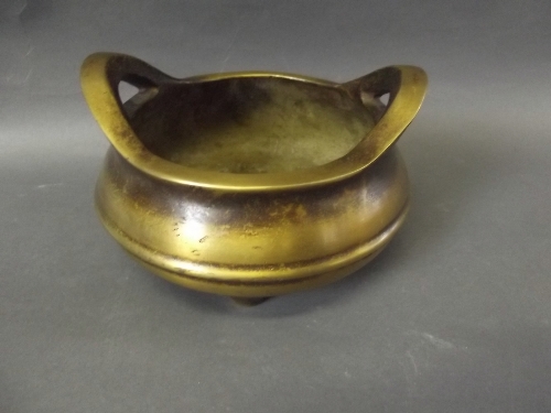 A Chinese bronze censer with an impressed mark to base, 6'' diameter