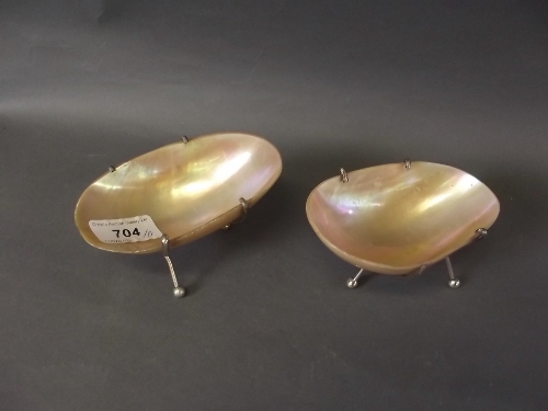 A pair of shell salts with silver plated mounts, 4¾'' x 2¾''