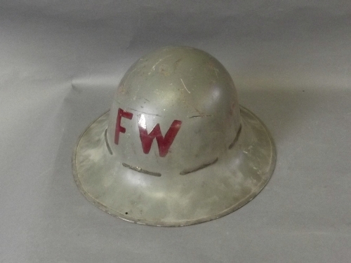 A WWII Fire Warden's helmet with leather lining, 6'' high