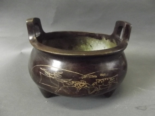 A Chinese bronze censer with etched deer decoration to sides, impressed mark to base, 6'' diameter