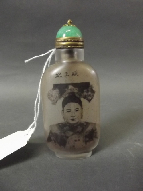 A Chinese reverse painted snuff bottle portrait of a young lady with inscription verso, 3½'' high