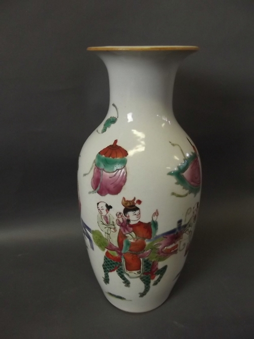 A Chinese vase decorated with a family riding a kylin and bats, printed mark to base, 10¾'' high