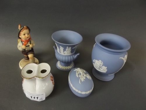 A M.J. Hummel figurine titled 'School Boy', a Wedgwood Jasperware trinket box and 2 vases, and a