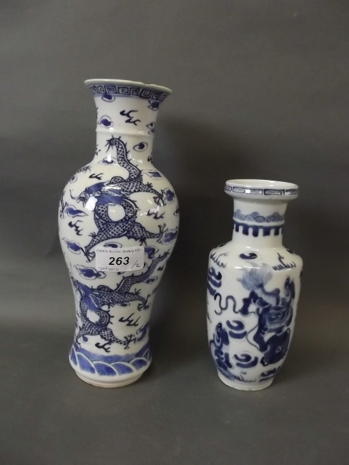 A C19th Chinese blue and white pottery vase painted with dragons, 4 character mark, 10'' high, and