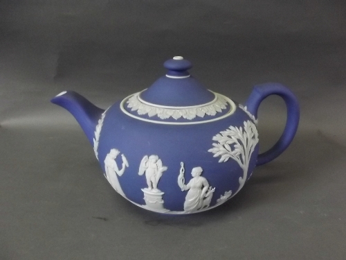 A good Wedgwood Jasperware teapot decorated with classical figures, 6'' high