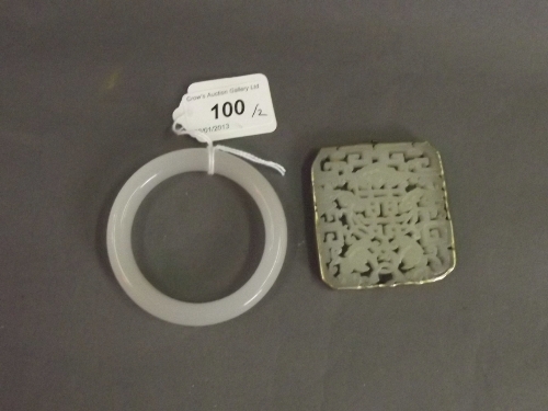 A Chinese white jade bangle and pendant