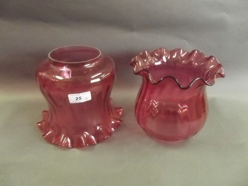 A pair of large cranberry glass shades with frilled decoration, 7'' diameter, 6½'' high