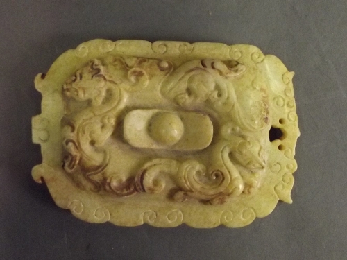 A carved hardstone pendant decorated with dragons, 3½'' x 2½''