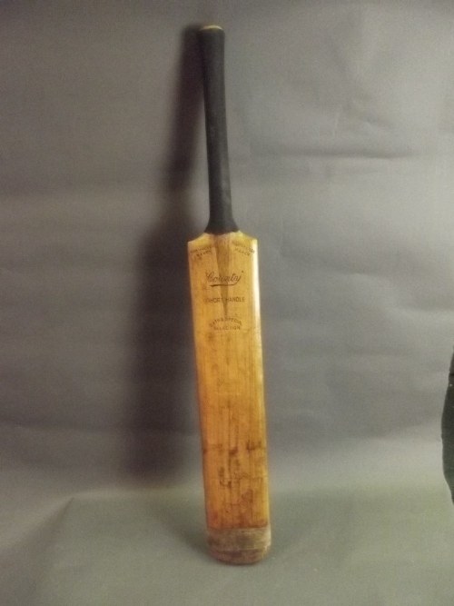 A Montague ODD 'County' cricket bat, 33½'' long, Best Bid