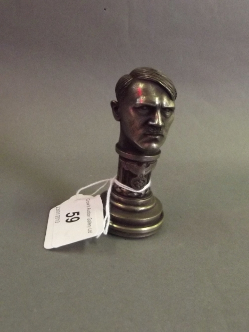 A metal seal in the form of Hitler, 3 1/8'' high