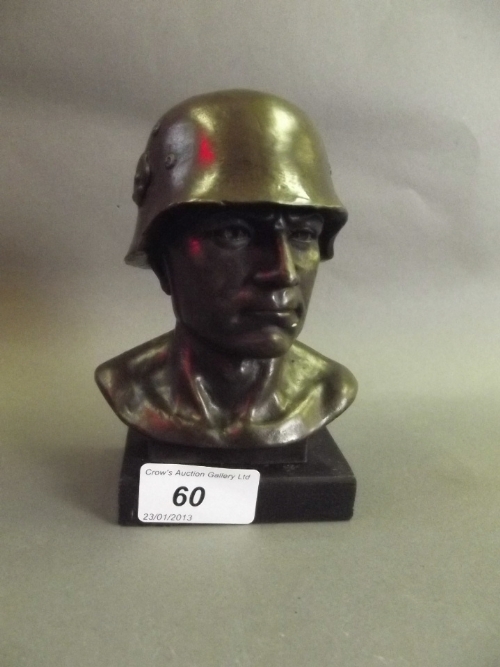 A bronze bust of a soldier, 5½'' high