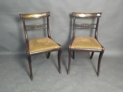 A pair of Regency brass inlaid side chairs