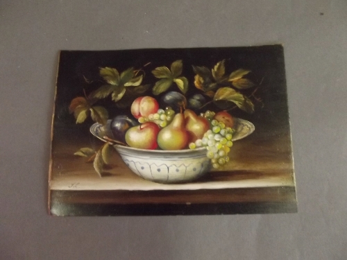 An oil on copper still life study of a bowl of fruit, monogrammed J.C., 5¾'' x 4'', unframed