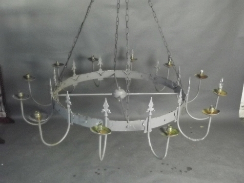 A painted metal 12 branch chandelier with fleur-de-lys decoration, 62'' diameter