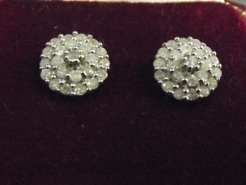 A pair of 9ct gold and diamond cluster studs, 1cm diameter