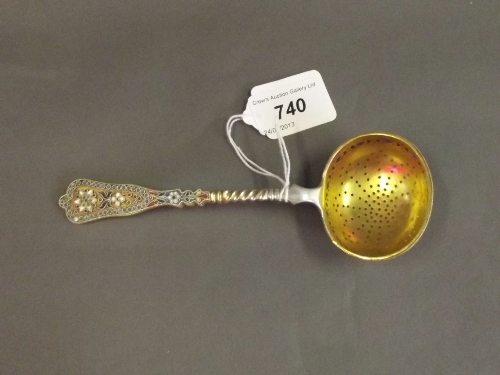 A silver gilt and enamel decorated sifter spoon, 6½'' long, 78g