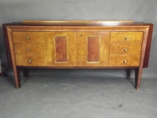 A mid C20th bow fronted burr walnut and glass topped buffet with fitted cocktail cabinet behind