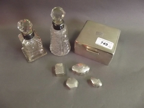 Four silver pill boxes, a Hallmarked silver cigarette box, and 2 Hallmarked silver rimmed cut