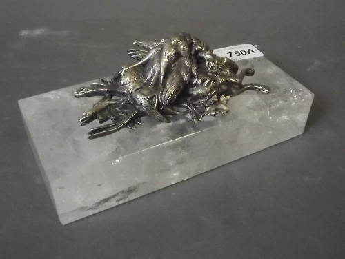 A rock crystal paperweight, with silver mounted top modelled as dead game after Ovdry, 7'' x 3'' x