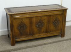 Medium oak blanket box, carved panel front