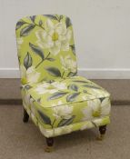 Modern nursing chair covered in Sanderson Grandiflora