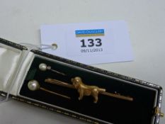 Spaniel bar brooch stamped 9ct, pearl and diamond stick pin stamped KD and a similar pin