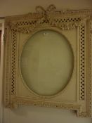 19th Oblique 20th Century ornate picture/mirror frame with oval aperture in ivory finish