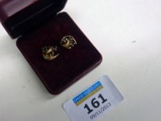 Pair of three stone sapphire ear-rings hallmarked 9ct