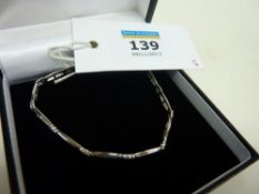 White gold bracelet set with cubic zirconia hallmarked 9ct