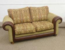 Three piece lounge suite in beige chenille cover with leather arm trims