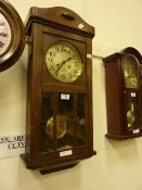 Mahogany wall clock with swept arch top, Mid 20th Century, 69cm high