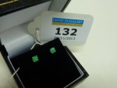 Pair of emerald ear-rings stamped 9k