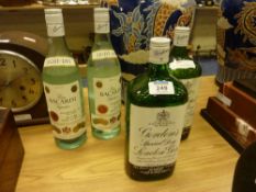 Gordon's Special Dry London Gin, 40.Fl.Ozs, another similar bottle and two bottles of Bacardi