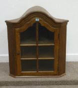 Medium oak glazed wall hanging corner cabinet