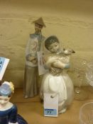 Nao figure of lady with lamb with Lladro style Oriental man