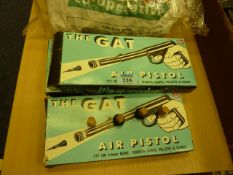 Three 177 cal. Gat air guns, boxed, with corks