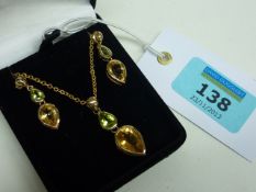 Peridot and citrine necklace stamped 375 and pair matching earrings