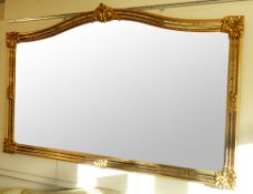Large wall mirror in mirrored gilt frame with shaped top, W184cm x H184cm