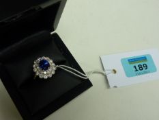 Sapphire approx 3 carat and diamond cluster ring  hallmarked 18ct