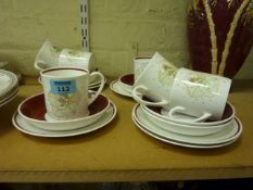 Set of six Susie Cooper coffee cans, saucers and plates