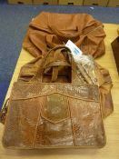 A snake skin handbag, purse, wallet and two leather bags