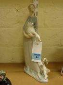 Lladro figure of a lady with a dog and goose