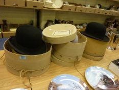 Bowler hat in box, retailed by R Spanton of Whitby, further bowler hat and a trilby from the same