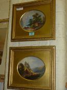Pair of Continental oval painted porcelain plaques of lakeside views, 19th Century