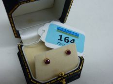 Pair of Burmese ruby ear-rings stamped 9k