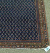 Persian Arak rug on blue ground, 262cm x 173cm